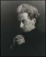 Free download [Man Looking Down, Hands Clasped] free photo or picture to be edited with GIMP online image editor